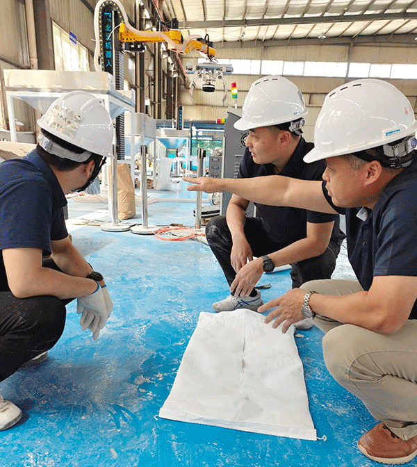 泰国客户莅临北元电气，共鉴面粉拆包投料机械手测试现场